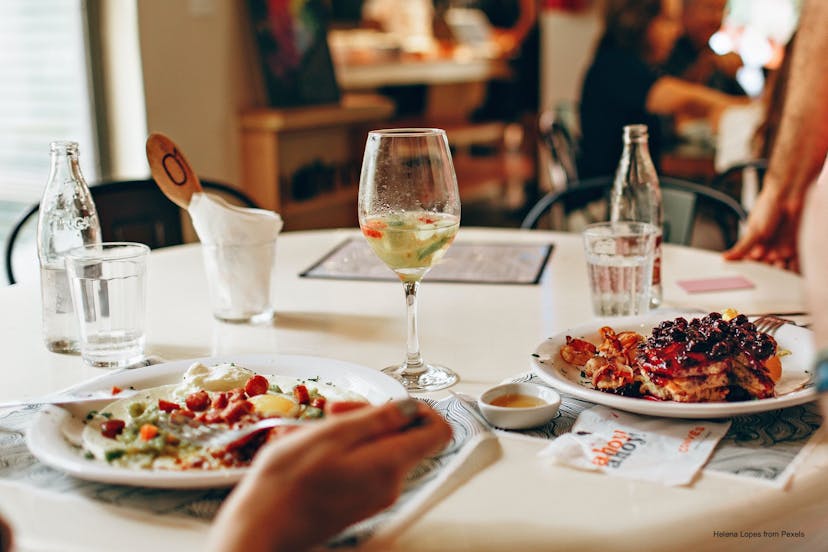 A holistic nutrition coach's simple tips to control your waistline and health while eating out.